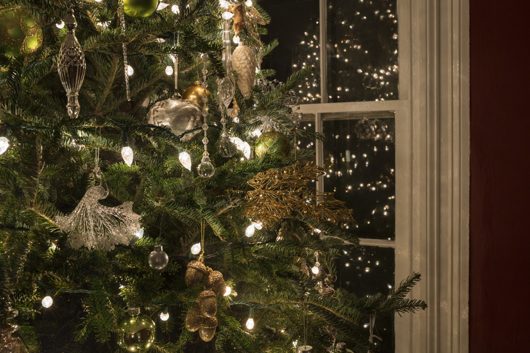 Christmas tree with white illuminated lights.