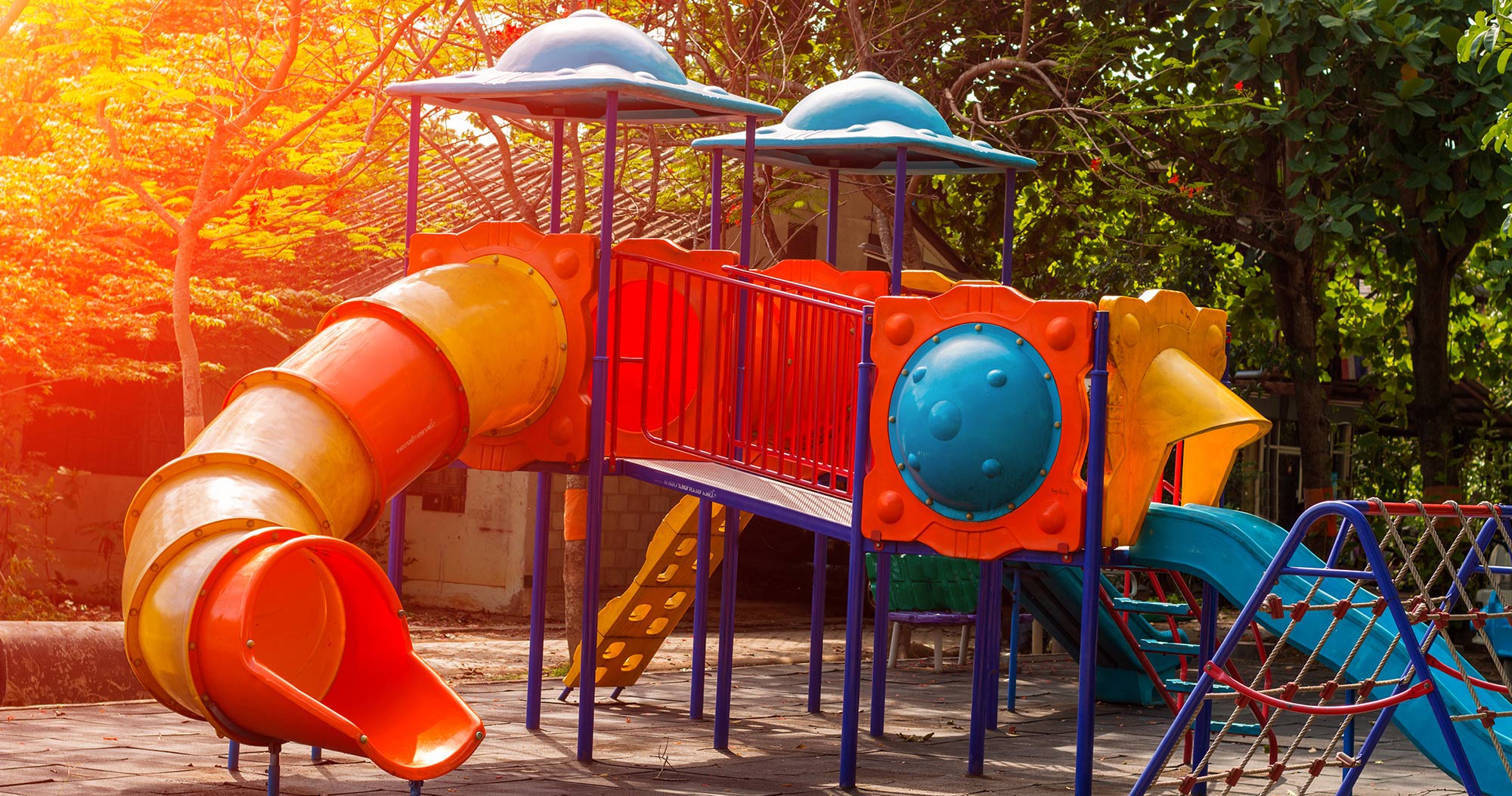 Sun-lit playground equipment.