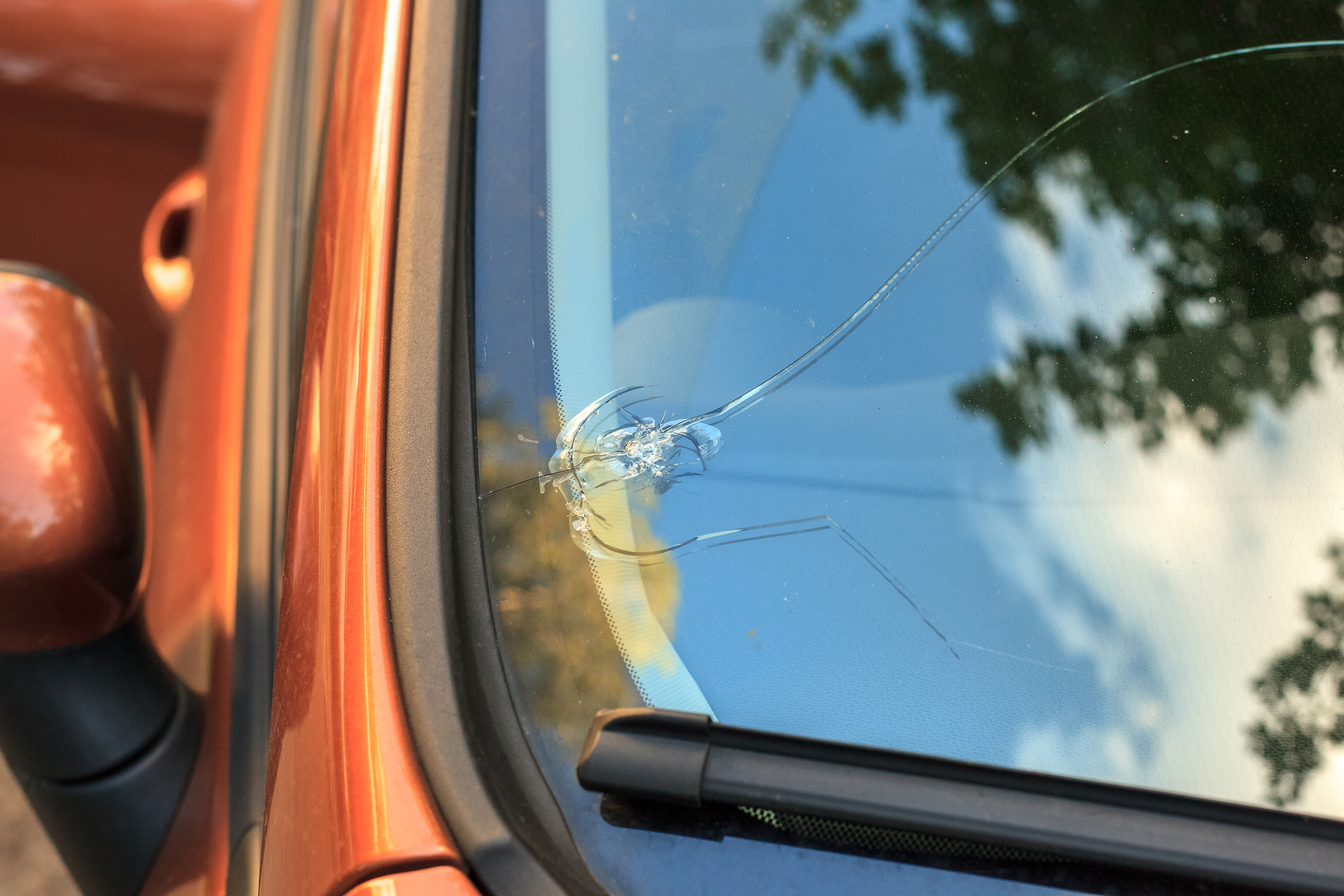 Vehicle windshield with chip.